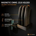 CMMG .22LR -lippaita magneettisessa telineessä asekaapin sisällä.